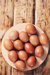 brown eggs in plate