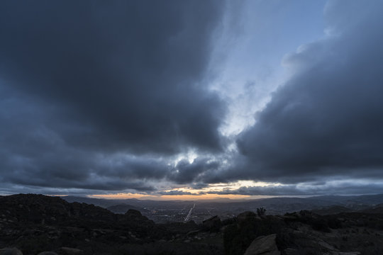 Stormy winter sky after sunset above suburban Simi Valley near Los Angeles California.