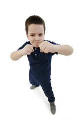 Wide angle,  Serious White Fighter Male Kid Posing with Closed Fists While Looking at the Camera. Isolated on White Background
