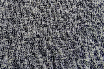 Grey knitting texture. Knitted cloth background