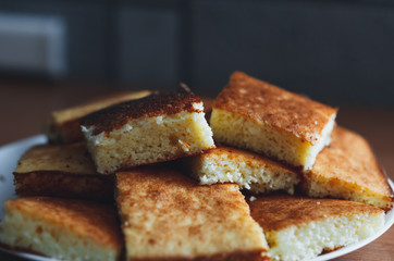 beautiful casserole on a plate of Golden-colored cottage cheese sweet tasty