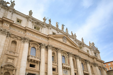Fototapeta na wymiar The facade of Saint Peter's Basilica in Vatican