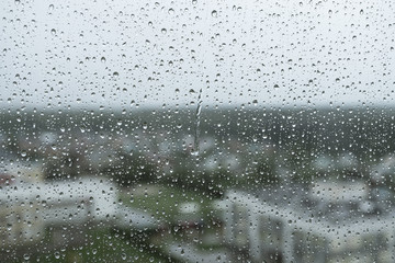 Rain drops on the window, Drops on glass background sadness