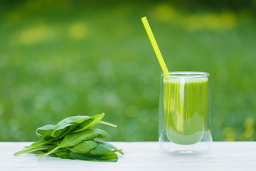 Green fresh healthy spinach and banana smoothie. Detox drink
