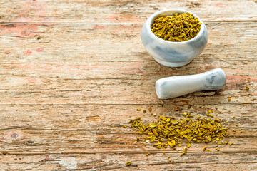 mistletoe, medicinal herb dried with mortar