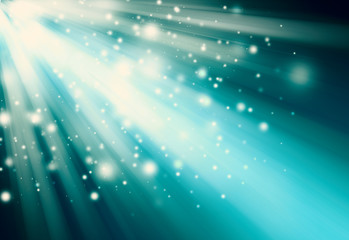 Blue glitter sparkles defocused rays lights bokeh radial abstract background/texture.