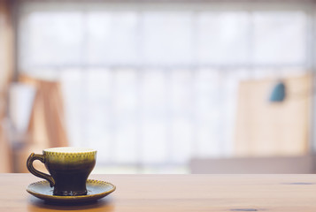 cup on wooden table