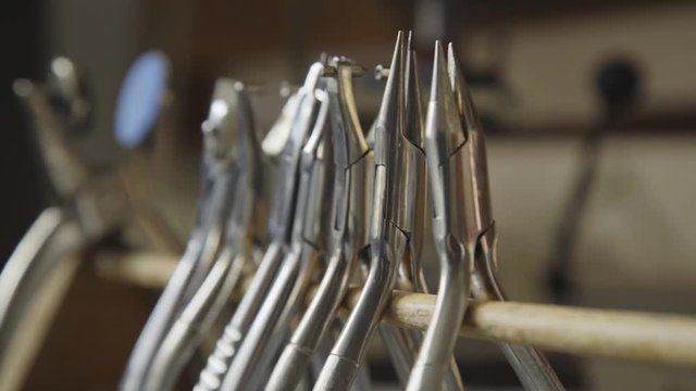 Macro shot of tongs hanging on a stick