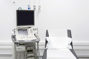 Gynecological office with bed and ultrasound machine