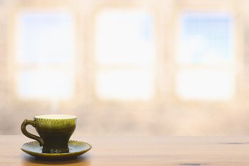 cup on wooden table