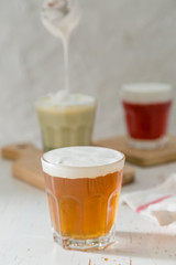 Taiwanese food trend - cheese tea assortment on white wood background
