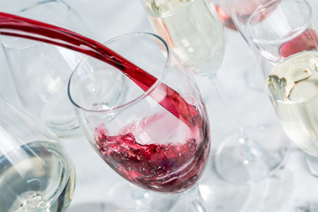 Wine tasting concept - glass with different wine on marble background