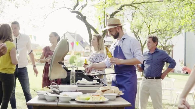 Family celebration or a barbecue party outside in the backyard.