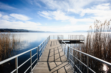 pier on Lake Varese, Biandronno, Lombardy, Italy