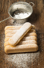 sponge biscuit - ladyfinger on a wooden table
