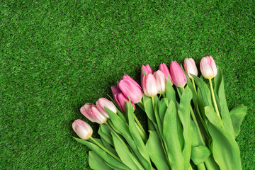 Bouquet of tulips on the grass