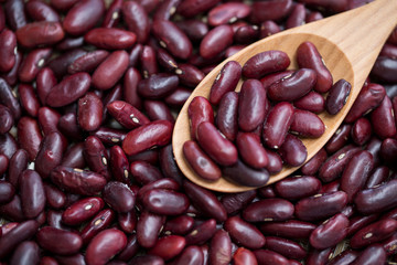Cereal grains , seeds, beans on wooden background.