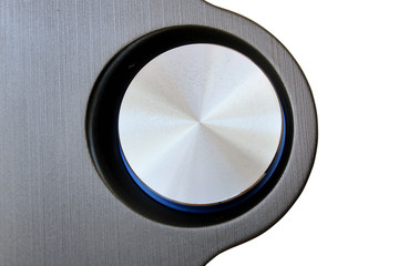 Closeup of a round volume knob isolated on white background