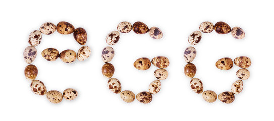 quail eggs in the shape of the letter E on a white background