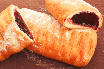 Fresh baked puff pies with natural blueberry jam inside © Mediagfx