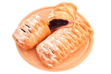 Sliced puff pie with blueberry jam filling
