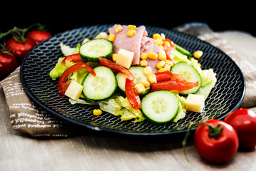 Delicious fresh salad and olive oil