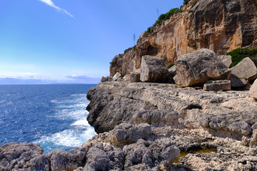 View looking out from the entrance to the fishing village of Cala Figueres, Mallorca, Spain