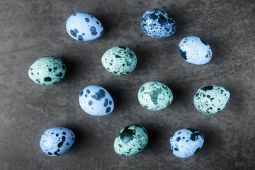 Blue Easter eggs over stone background.