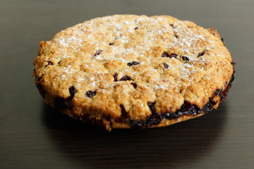 Cherry pie on the dark table