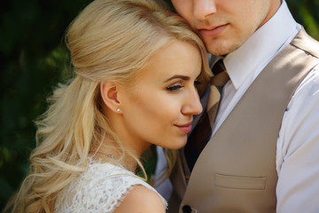 Wedding portrait. Beautiful bride and groom at wedding day.