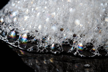 Abstract background white soapy foam texture. Shampoo foam with bubbles