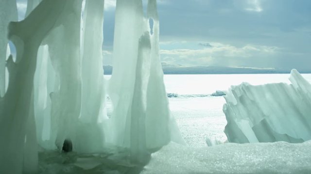 Icebergs on iced sea or ocean.