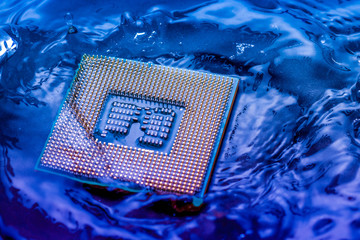 technology cyber electronic concept. cpu ram computer Fall into the water on blue light background....