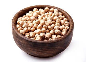 Chickpeas in wooden  bowl isolated on white