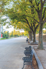 Naklejka premium Gokurakubashi bridge and Osaka Castle with morning sunrise in autumn season, Osaka, Japan