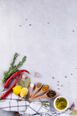 Ingredients for cooking.  Selection of spices and herbs Food background on gray table. Top view copy space.