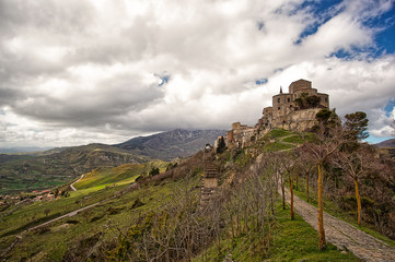 Beautiful HDR image of Sicilian village Petralia Soprana with church of Santa Maria di Loreto in the front.