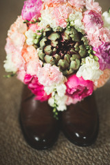 Beautiful wedding bouquet with different flowers, roses