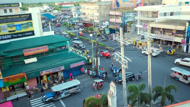 LEGAZPI, PHILIPPINES - JANUARY 5, 2018: Traffic on one of the central streets of the city of Legazpi.