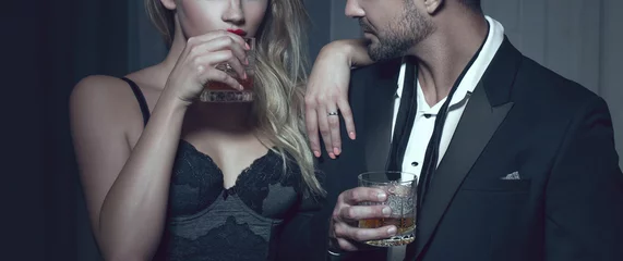 Rich man with lover with drink in night club © sakkmesterke