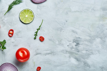 Seamless pattern with red pepper, onion, tomatoes, lime, dill on white background, top view, close-up, selective focus