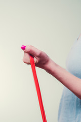 female working out with workout resistance bands