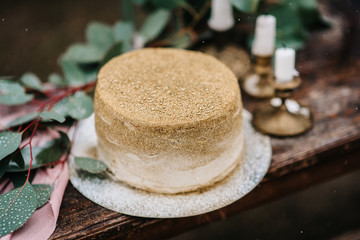 wedding decor with a golden cake