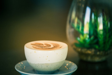 Hot coffee vintage tone and selective focus shallow depth of field