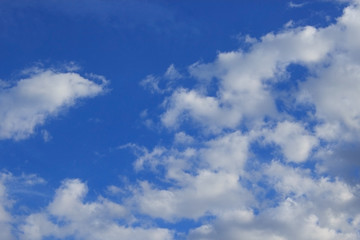Naklejka na ściany i meble Clouds in the blue sky.