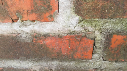 Texture of red bricks close-up old structure reliable masonry time-tested