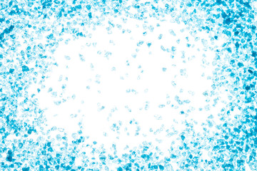 Blue crystals of sea salt. Frame on white background