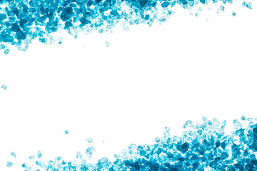 Crystals of blue sea salt. Border on white background