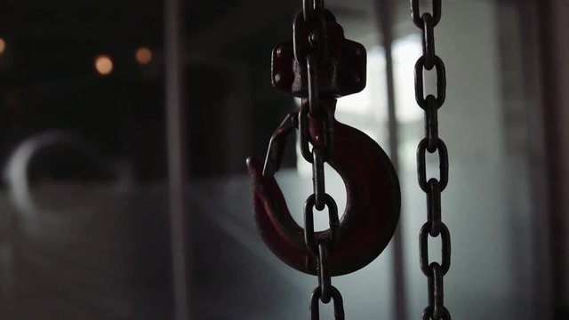 A Slip Hook Hangs On The End Of A Chain