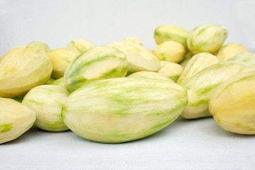 Pile of raw mangoes Thai fruit on white canvas background